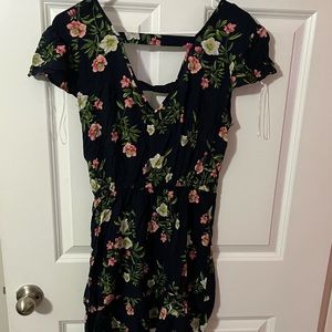 Navy dress with flowers.